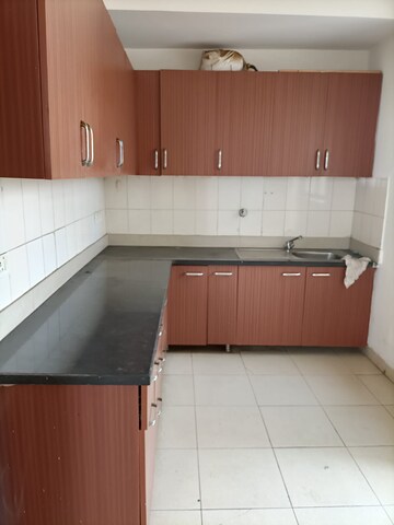 Kitchen in 2 BHK Apartment at Unitech Uniworld Resorts-The Residences, Sector 33 – for Rent