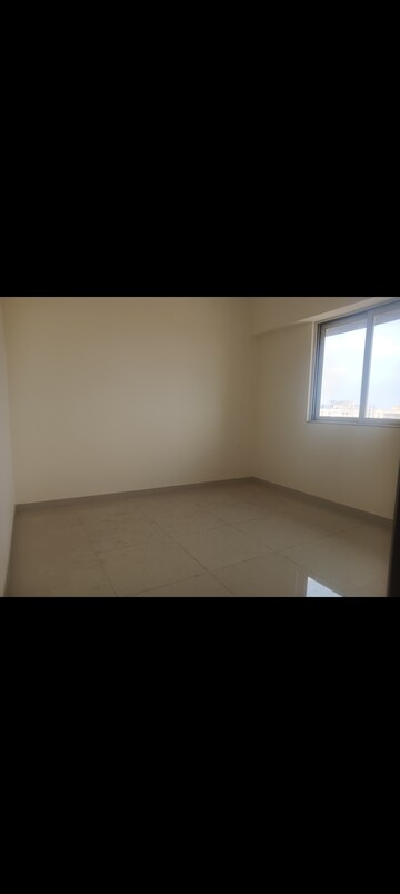 Room in 2 BHK Apartment at Omkar Signet, Malad East – for Rent