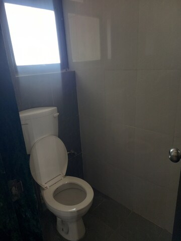 Bathroom in 3 BHK Apartment at Puravankara Silversands, Mundhwa – for Rent