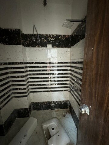 Bathroom in 3 BHK Builder Floor at Srijan PR Enclave, Mahurali – for Sale