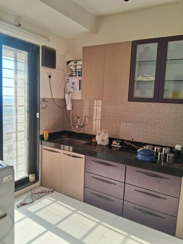Kitchen in 2 BHK Apartment at Acme Avenue, Kandivali West – for Rent