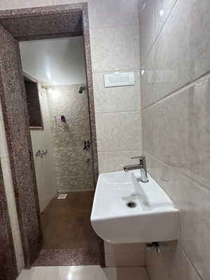 Bathroom in 1 BHK Apartment at Mangeshi Star, Ambivali – for Sale