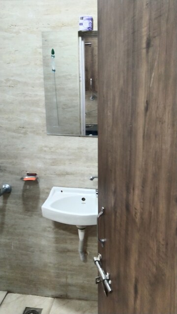 Bathroom in 1 RK Apartment at Dhoot Time Residency, Sector 63 – for Sale