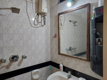 Bathroom in 1 BHK Apartment at Tata Symphony, Chandivali – for Rent