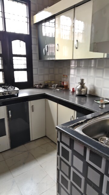 Kitchen in 1.5 BHK Builder Floor at Model Town – for Rent