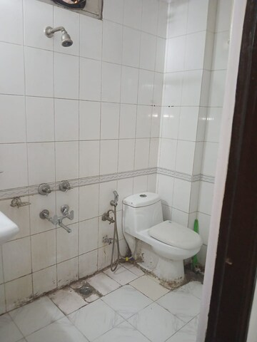 Bathroom in 3 BHK Builder Floor at Khirki Extension – for Rent