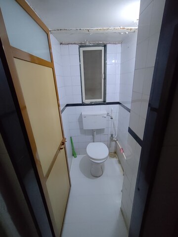 Bathroom in 1 BHK Apartment at Neelkamal Gruh CHS LTD, Chincholi Phatak – for Rent