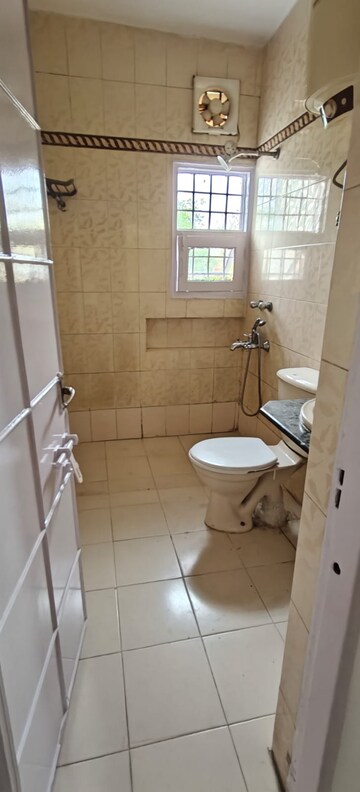 Bathroom in 3 BHK Apartment at Vasant Vihar – for Rent