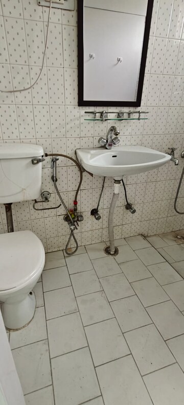 Bathroom in 3 BHK Apartment at Vasant Vihar – for Rent