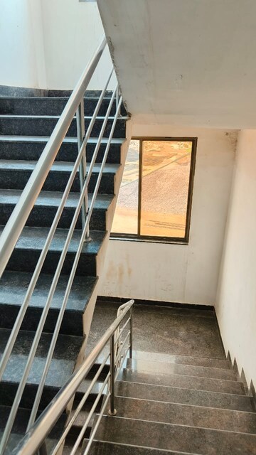 Staircase in 2 BHK Apartment at Mahadeo Ghat Road – for Sale