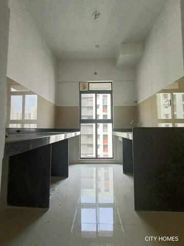 Kitchen in 1 BHK Apartment at Lodha Palava Downtown, Dombivli East – for Rent