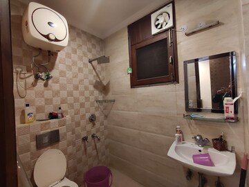 Bathroom in 2 BHK Apartment at Boutique Residential Apartments C-220, Malviya Nagar – for Rent