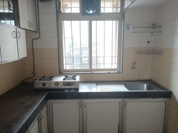 Kitchen in 3 BHK Apartment at Dosti Group Acres, Wadala East – for Rent