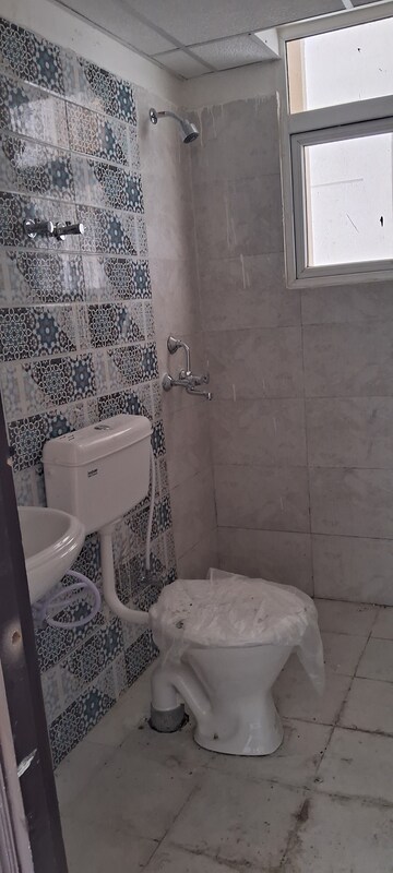 Bathroom in 2 BHK Apartment at Signature Global Proxima, Sector 89 – for Rent