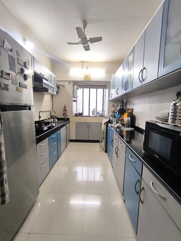 Kitchen in 2 BHK Apartment at Vastu Tower, Malad West – for Rent