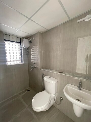 Bathroom in 1 BHK Apartment at Runwal Gardens Phase I, Dombivli East – for Rent