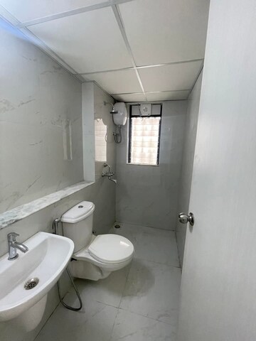 Bathroom in 1 BHK Apartment at Runwal Gardens Phase I, Dombivli East – for Rent