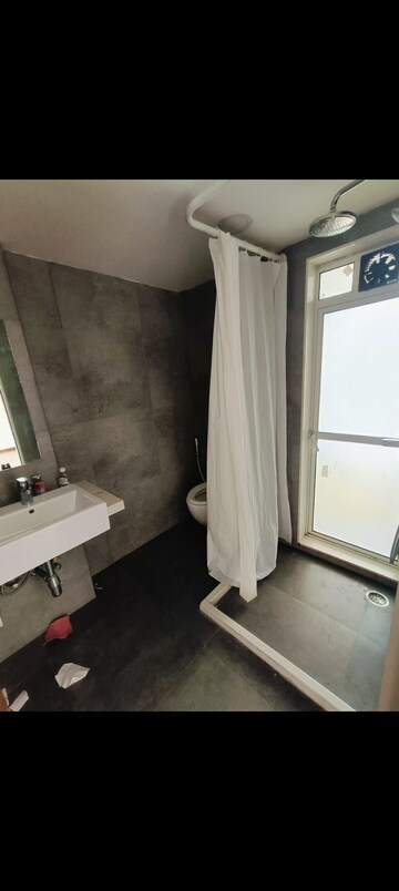 Bathroom in 2 BHK Apartment at Paradigm Nivan, Khar West – for Rent