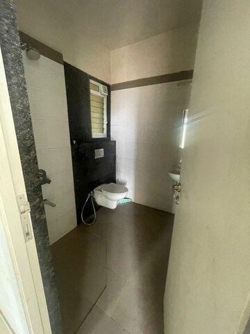 Bathroom in 2 BHK Apartment at Rustomjee Azziano Wing E, Majiwada – for Rent