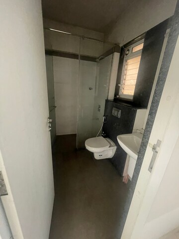 Bathroom in 2 BHK Apartment at Rustomjee Azziano Wing E, Majiwada – for Rent