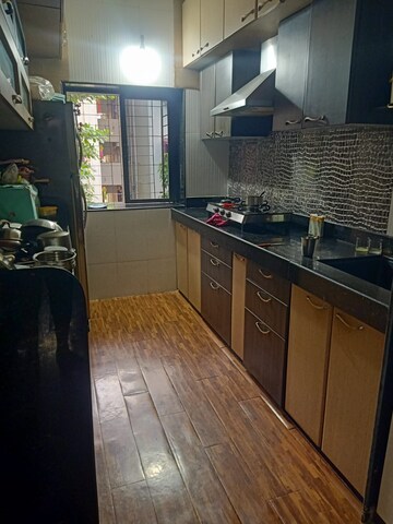 Kitchen in 2 BHK Apartment at Gokuldham Complex, Goregaon East – for Rent