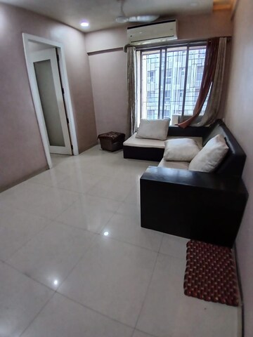 Living Room in 1 BHK Apartment at Urvi Park, Majiwada – for Sale