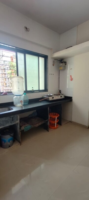 Kitchen in 2 BHK Apartment at Priyal Aum, Vashi Sector 26 – for Rent