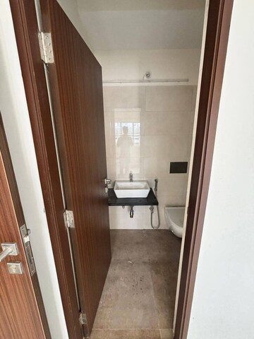 Bathroom in 1 BHK Apartment at Omkar Signet, Malad East – for Rent