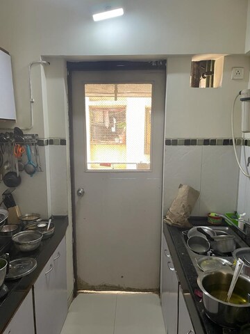 Kitchen in 1 BHK Apartment at Omkar Raga, Chembur – for Rent