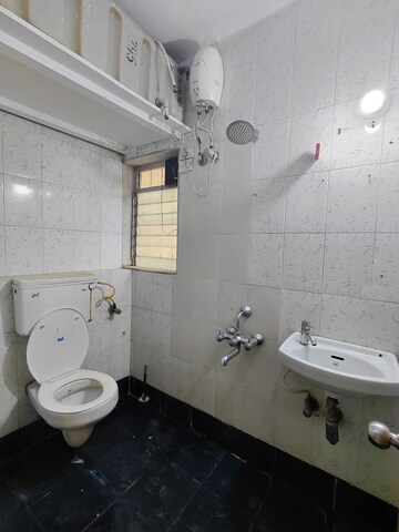 Bathroom in 2 BHK Apartment at HDIL Dheeraj Jamuna, Malad West – for Rent