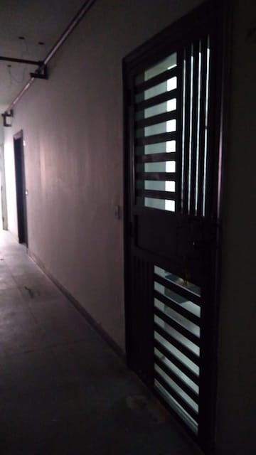 Living Room in 1 RK Apartment at Logix Blossom Greens, Sector 143 – for Rent