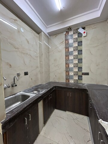 Kitchen in 2 BHK Apartment at Sector 13 Dwarka – for Rent
