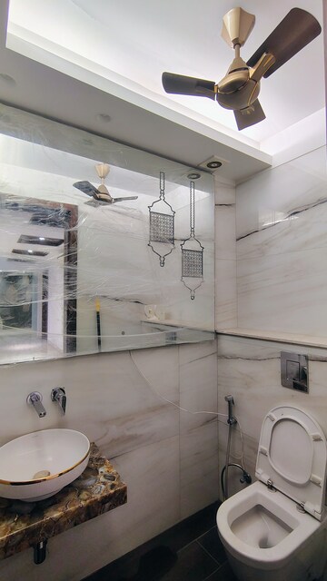 Bathroom in 4 BHK Builder Floor at DLF Atria, Dlf Phase ii – for Rent