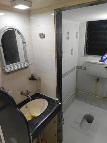 Bathroom in 1 BHK Apartment at Raj Park CHS, Kalwa – for Rent