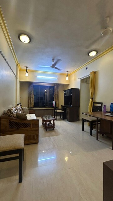 Living Room in 2 BHK Apartment at Romell Diva, Malad West – for Rent