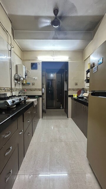 Kitchen in 2 BHK Apartment at Romell Diva, Malad West – for Rent