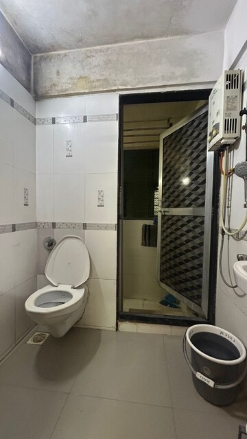 Bathroom in 2 BHK Apartment at Romell Diva, Malad West – for Rent