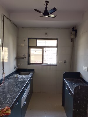 Kitchen in 1 BHK Apartment at SS Rishabh Villa, Malad East – for Sale
