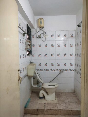 Bathroom in 2 BHK Apartment at Devidayal Apartments, Mulund West – for Rent