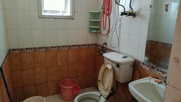 Bathroom in 3 BHK Apartment at Parsvnath Majestic Floors, Vaibhav Khand – for Rent