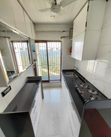 Kitchen in 1 BHK Apartment at Brookhill Tower, Andheri West – for Sale