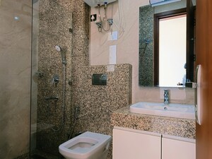 Bathroom in 3.5 BHK Builder Floor at Shivalik Colony – for Sale