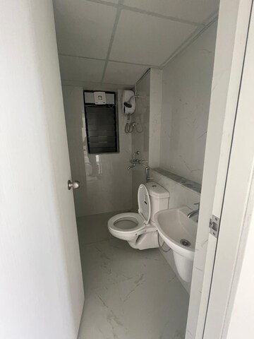 Bathroom in 2 BHK Apartment at Runwal Gardens Phase 2, Dombivli East – for Rent