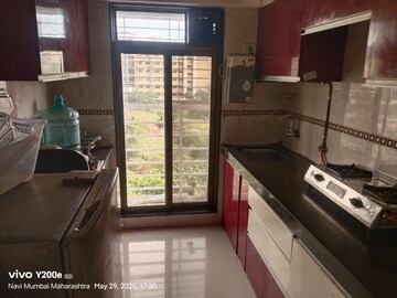 Kitchen in 1 BHK Apartment at Swaraj Bella Vista, Ghansoli – for Rent