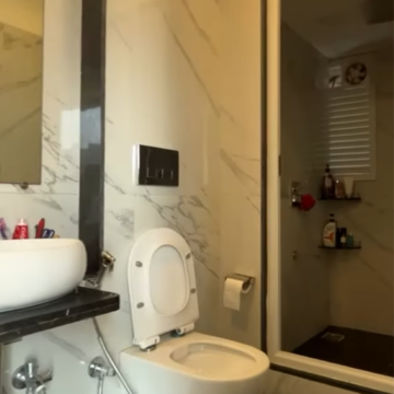 Bathroom in 4 BHK Apartment at Rustomjee Elanza, Ram Nagar – for Rent