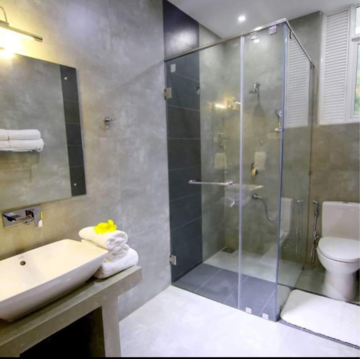 Bathroom in 4 BHK Apartment at Sheth Auris Serenity Tower 1, Kanch Pada – for Rent