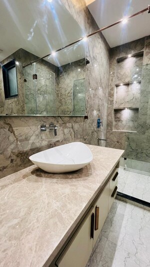 Bathroom in 4 BHK Builder Floor at Jalvayu Towers, Sector 56 – for Sale