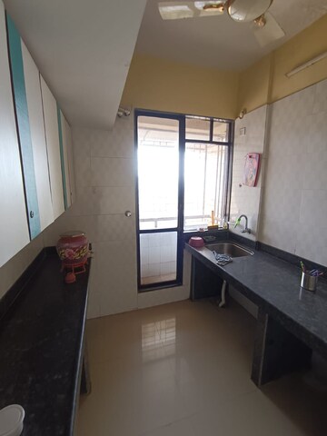 Kitchen in 1 BHK Apartment at Ajmera Yogidham Emerald, Kalyan West – for Rent