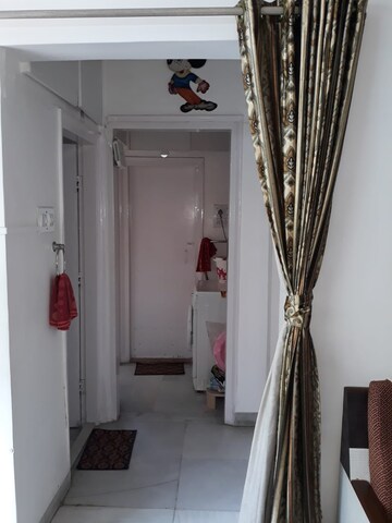 Bathroom in 2 BHK Apartment at Queens Land Apartment, Andheri West – for Sale
