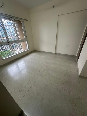 Room in 2 BHK Apartment at Dosti West County, Balkum Pada – for Rent